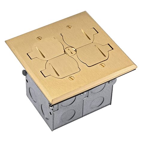 Two-gang brass floor box with flip lids with two duplex receptacles