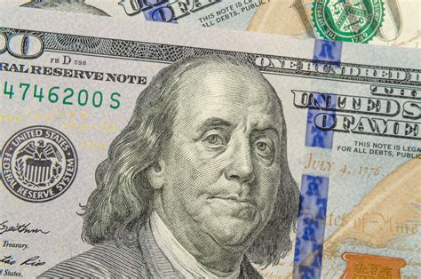 Premium Photo | Benjamin franklin on a hundred-dollar bill.