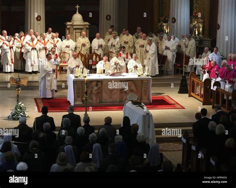 Members of the clergy and the public attend the funeral mass of late ...