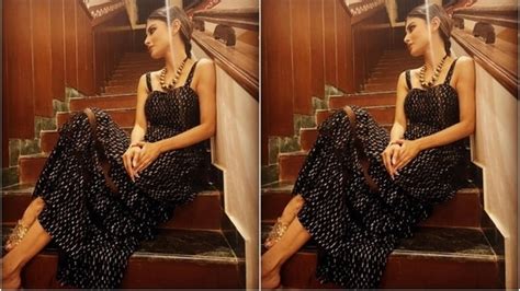 Mouni Roy is the picture of elegance in sleeveless black dress and bold ...