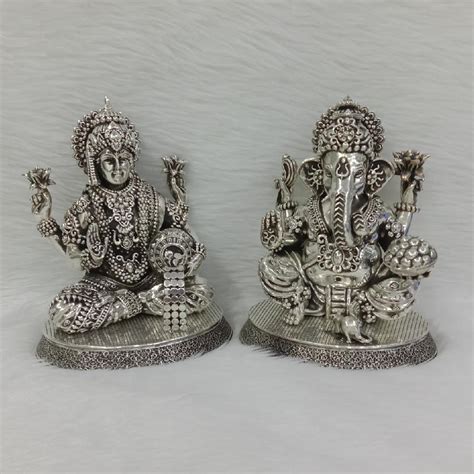 Buy quality Pure silver idol of laxmi ganesha in antique polish in New ...