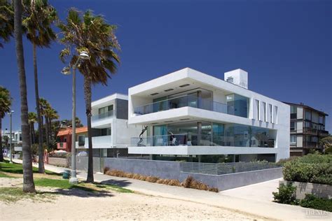 Modern beachfront house with pivot walls, light-filled… | Beachfront ...