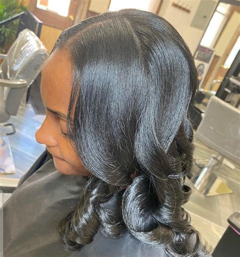 What’s The Difference Between a Silk Press and a Blowout? | NaturallyCurly