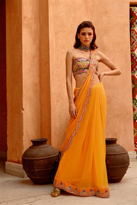 Mango yellow saree with pre-stitched palla and pleats with bejewelled ...