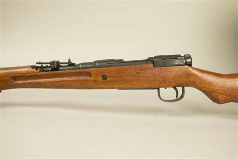Japanese Arisaka Type 38 Rifle, Bayonet, and Cleaning Kit | Witherell's ...