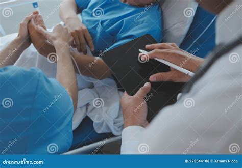 Injured Patient Showing Doctor Broken Wrist and Arm with Bandage in ...