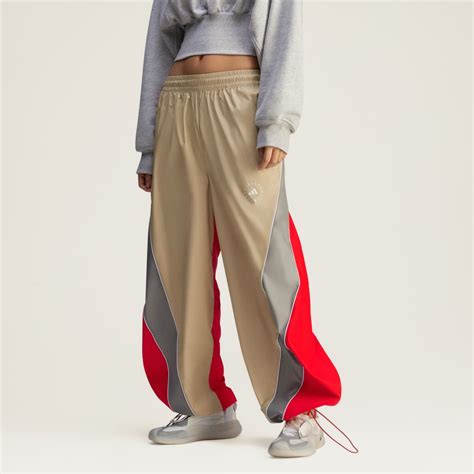 CLOTHING - adidas by Stella McCartney Track Pants - Beige | adidas Kuwait
