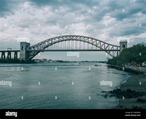 The Hells Gate Bridge over the East River, seen from Astoria, Queens ...