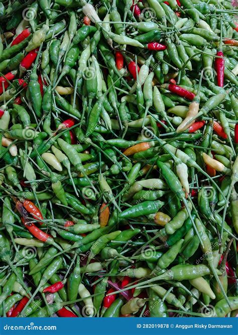 A Bunch of Fresh Cayenne Peppers in a Traditional Vegetable Stock Photo ...