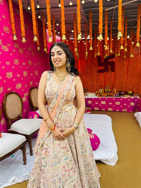 NIKITA KHURANA IN PEACH MULTI COLOR EMBRIODERED LEHENGA SET ...