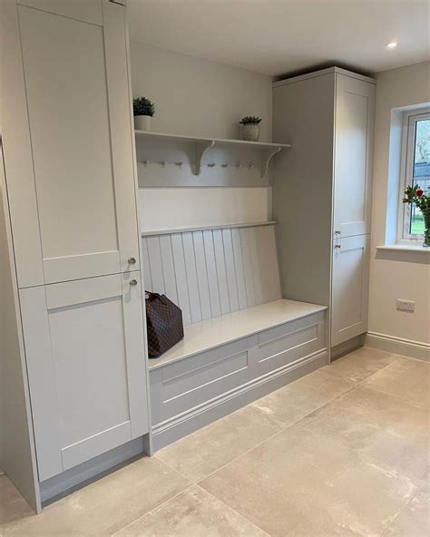 Minimalist Mudroom With Neutral Floor Tiles - Soul & Lane