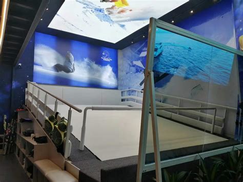 Treadmill ski simulator machine—infinite ski slope for indoor ski centers.