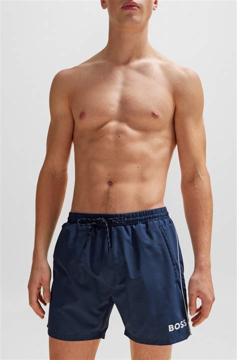 BOSS - Quick-drying swim shorts with logo and piping - Dark Blue