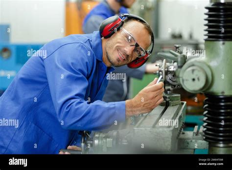 The Machine Operator Just Watching Another Machine Operator Working 的图像结果