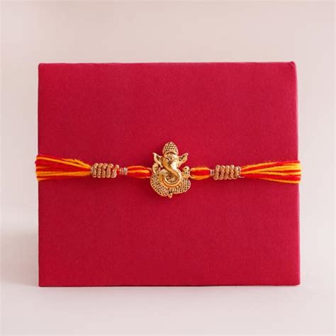 Send Ganesha Rakhi with Lord Ganesha Idol Online