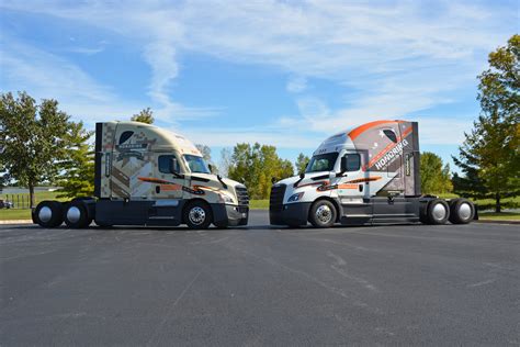 Military-wrapped trucks honor Schneider veterans