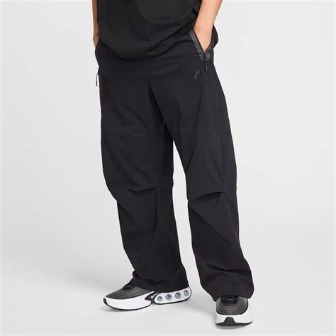 Black Nike Tech Pants. Nike.com