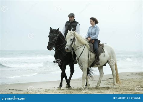 Riders and horses stock photo. Image of couple, sport - 166881918