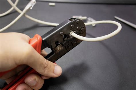 Crimping Ethernet Cable Stock Photos, Pictures & Royalty-Free Images ...