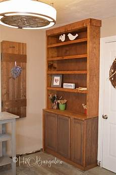 Cost To Build Bookshelves by How To Build Built In Bookcases With Cabinets H2obungalow Cost To Build Bookshelves
