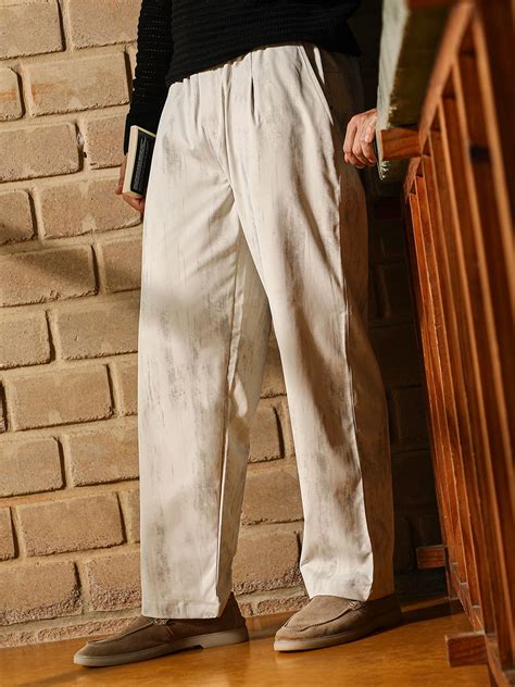 ₹999 | Campus Sutra Men's Ivory White Gazed-Imprint Relaxed Trousers ...