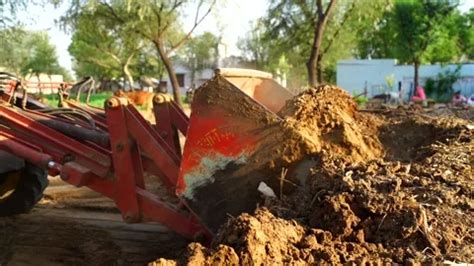 Image result for Operating a Tractor with a Loader