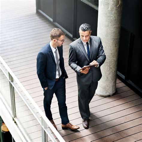 Business Men Walking in Line 的图像结果