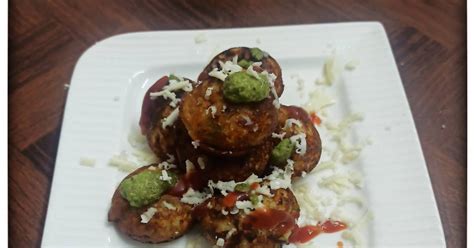 3 in 1 Pizza Flavor Rava Appe topped with Cheese, Chutney and Ketchup ...