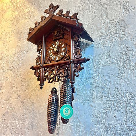 Mechanical original cuckoo clock with hand carved maple leaves pattern ...