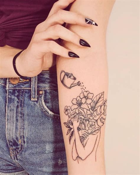pretty arm tattoos for women