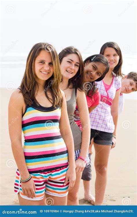 Teens on beach stock photo. Image of laugh, cheerful - 10970984