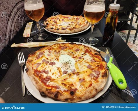 Pizzas in a Restaurant for Dinner Stock Image - Image of spanish, tapas ...