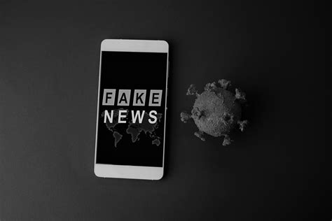 Stock photo 1689133909 - Fake news coronavirus on red background . Fake ...