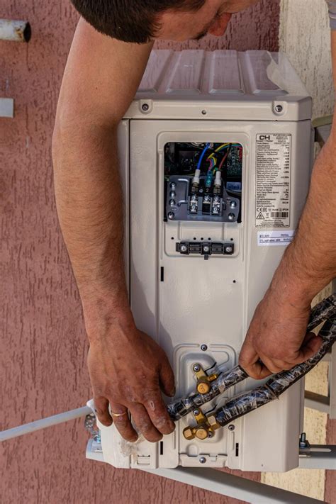 Installing an air conditioner in an apartment office closeup | Premium ...