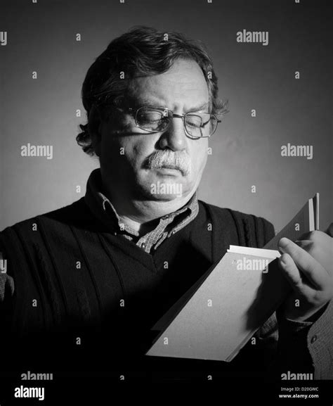 Man and book hi-res stock photography and images - Alamy