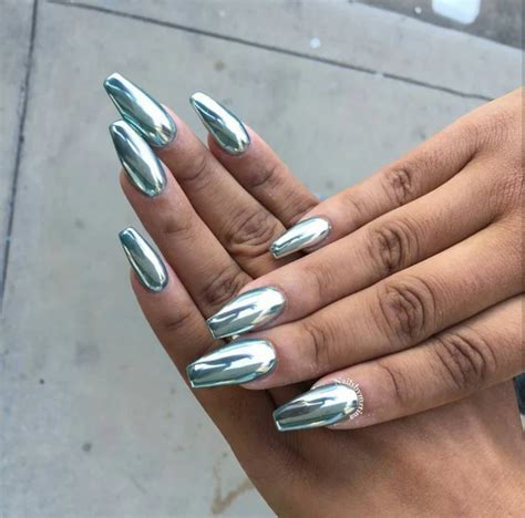 https://deavita.net/wp-content/uploads/2023/04/long-mirror-chrome-nails-in-blue-shade.webp