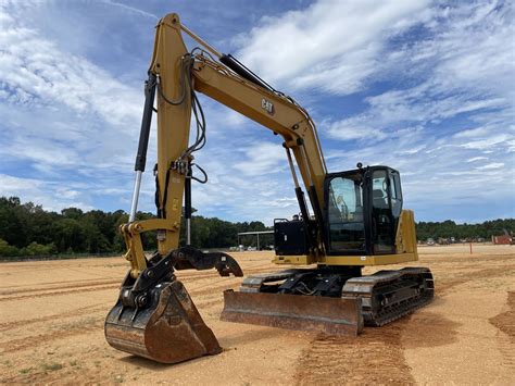 2022 CAT 310 Excavator - J.M. Wood Auction Company, Inc.