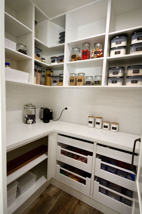 WALK IN PANTRY - Custom built walk in pantry with a stone bench top and ...