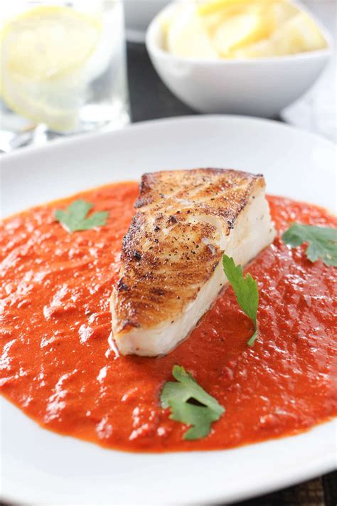 Pan Roasted Chilean Sea Bass with Roasted Red Pepper Sauce - Girl and ...