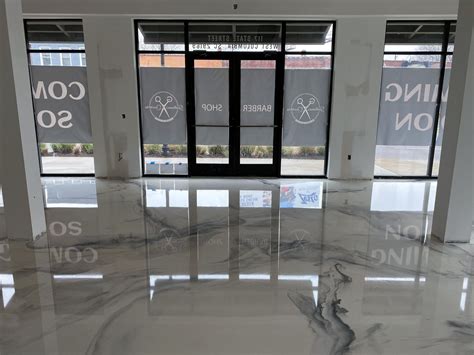 White Marble Metallic Epoxy Floor from Glossy Floors