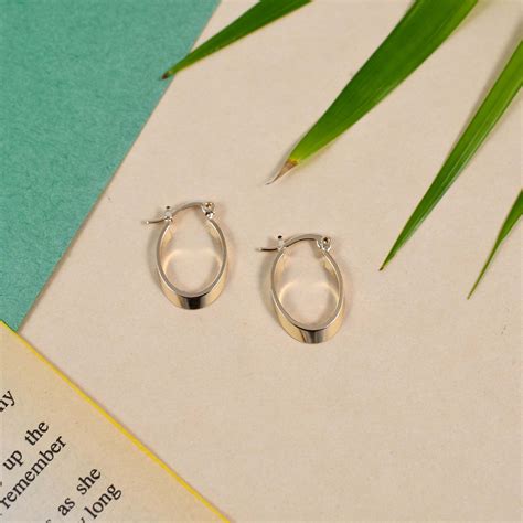 Minimalist Gold Oval Huggies – Salty Accessories