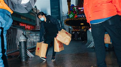 With inflation biting, shoppers line up to seek deals at Macy’s in New York. - The New York Times