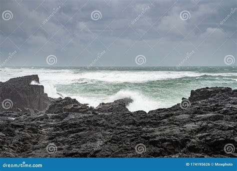 Brimketill Lava Rock Pool in Iceland Waves Hitting Black Basalt Rock ...