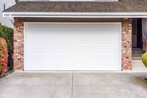 How Much Does a Garage Door Dent Repair Cost? (2026)
