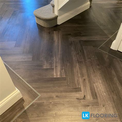 Hallway Herringbone and Border Laminate Flooring Installation