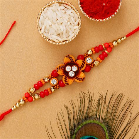 Designer Bro Rakhi and Roli Chawal Pack - eCraftIndia Online