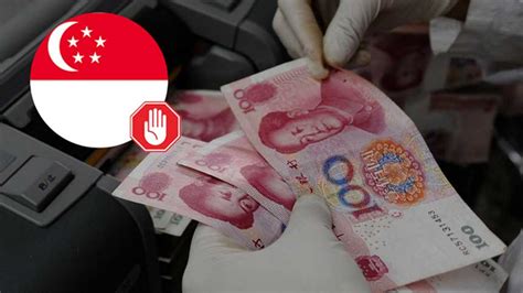 中国冻结七千万汇款 新加坡喊停 | 新加坡金融管理局 | 跨境汇款 | 中国 | 冻结 | 银联卡 | 希望之声