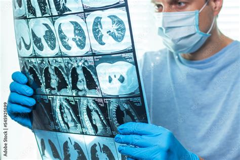 Image of a doctor and a patient reviewing a scan.