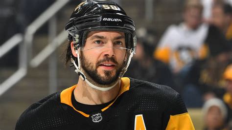 Download Handsome Ice Hockey Player Kris Letang Wallpaper | Wallpapers.com