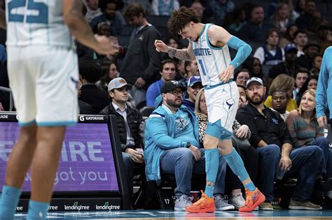 LaMelo Ball injury: Hurts same ankle on fan's foot in Hornets loss ...